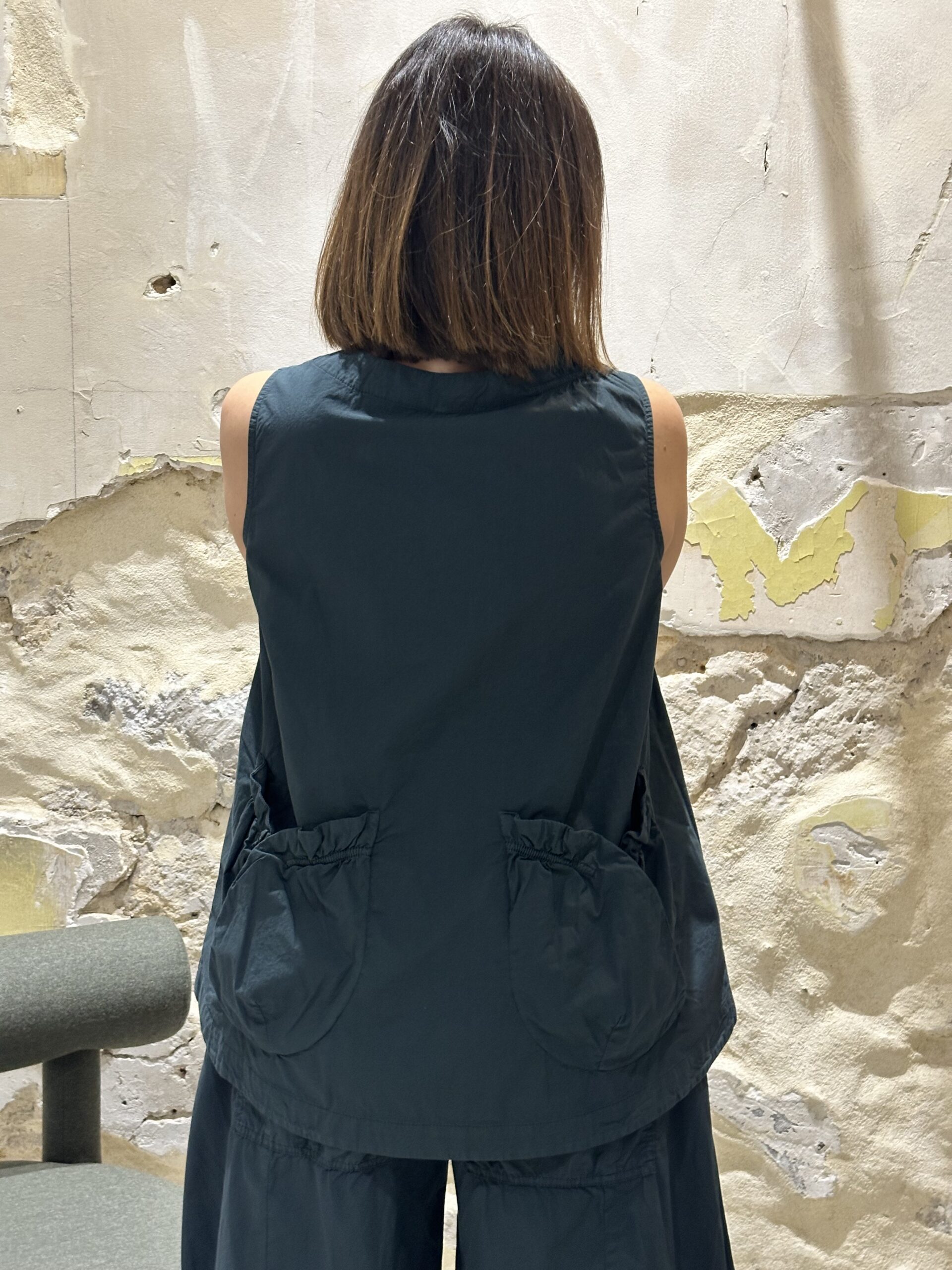 Blouse sans manches à pan croisé